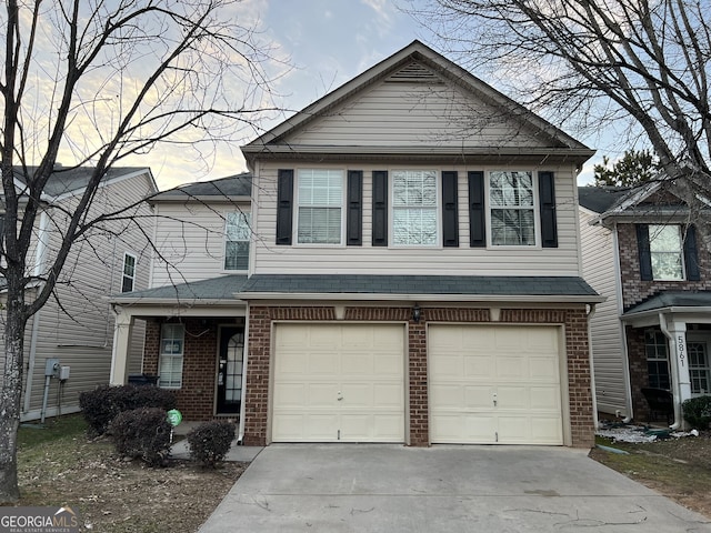 view of front of home with a garage