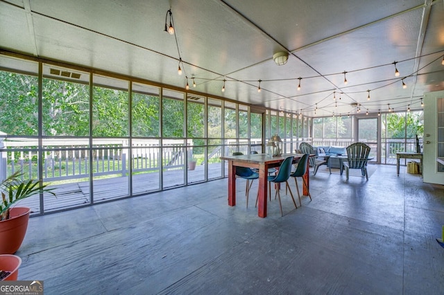 sunroom / solarium with a healthy amount of sunlight