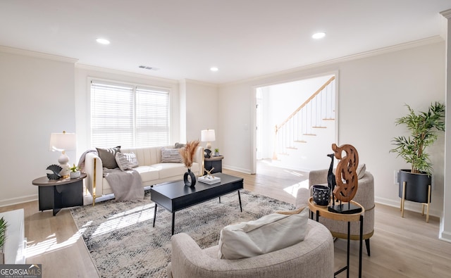 carpeted bedroom with crown molding and ceiling fan