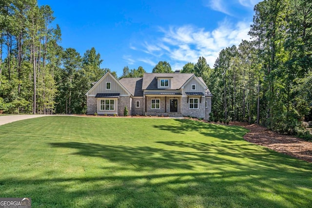 view of front facade featuring board and batten siding and a front lawn