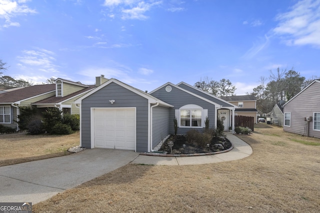 view of front facade featuring a garage and a front yard