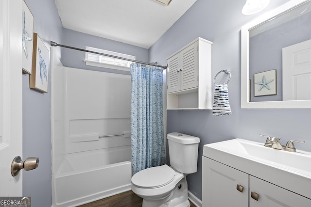 full bathroom featuring shower / tub combo with curtain, vanity, hardwood / wood-style floors, and toilet