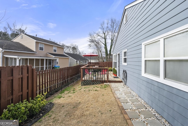 view of yard featuring a deck