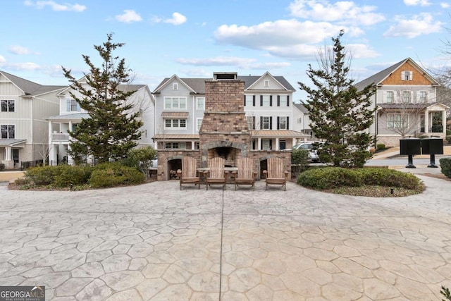 back of house with a patio area