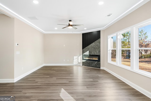 526 Whirlway St, Jefferson, GA 30549 - unfurnished living room featuring ceiling fan, recessed lighting, baseboards, a fireplace, and crown molding