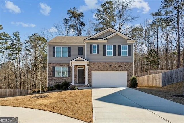 view of front of property featuring a garage