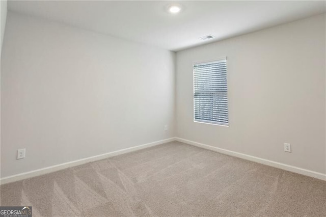 unfurnished room with carpet