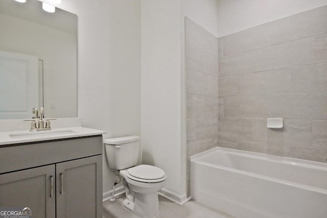 full bathroom featuring tiled shower / bath combo, toilet, tile patterned flooring, and vanity