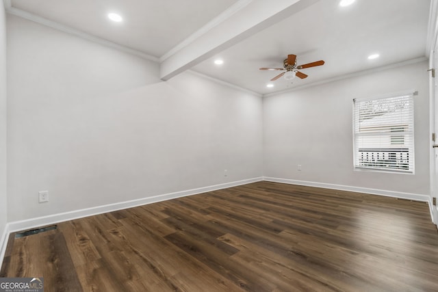 empty room featuring ceiling fan, dark hardwood / wood-style floors, and crown molding