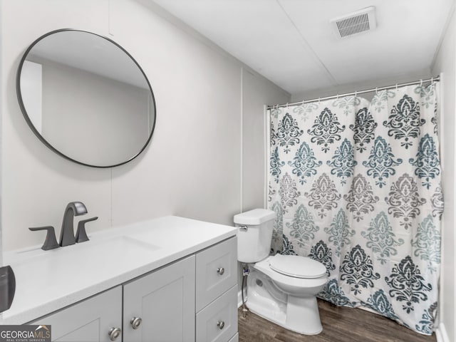 381 Martin Dairy Rd, Milner, GA 30257 - full bathroom with wood finished floors, vanity, and curtained shower