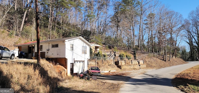 view of home's exterior featuring a garage