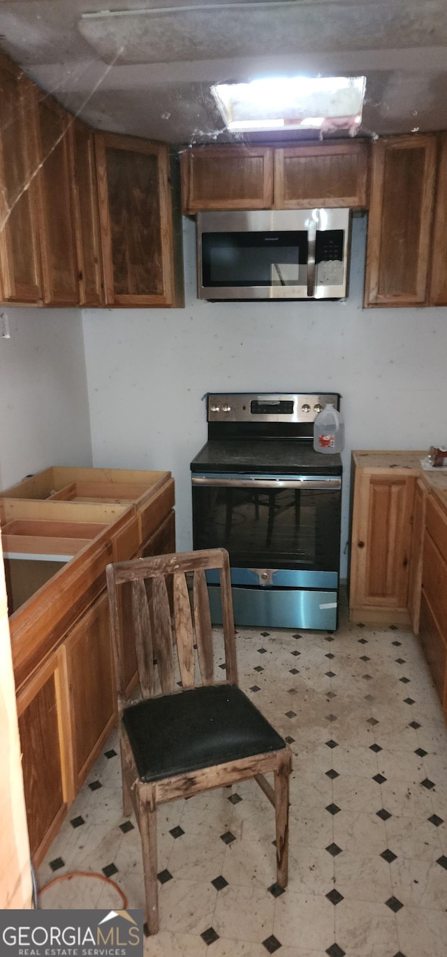 kitchen with appliances with stainless steel finishes