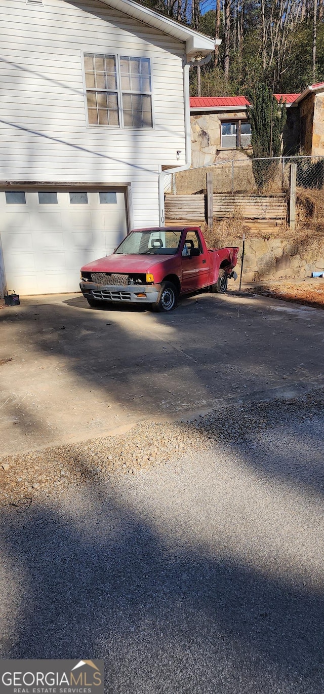 exterior space featuring a garage