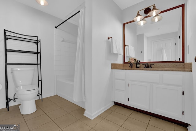 full bathroom with tile patterned floors, toilet, shower / tub combo, and vanity