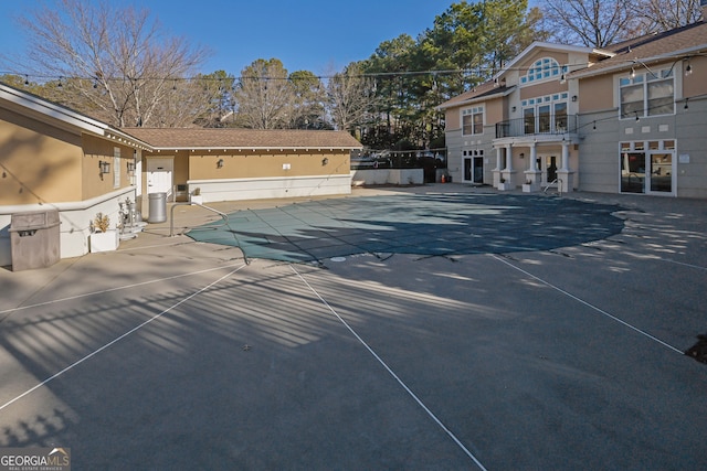 view of pool featuring a patio area