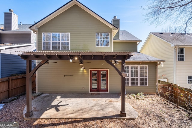 rear view of property with a patio area and french doors