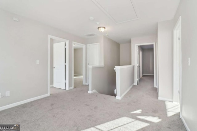 interior space featuring light colored carpet