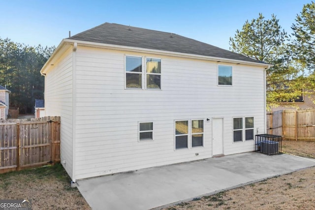 back of property with a patio area