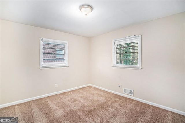 view of carpeted spare room