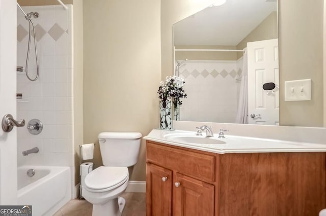 full bathroom with toilet, vanity, tiled shower / bath, and tile patterned flooring