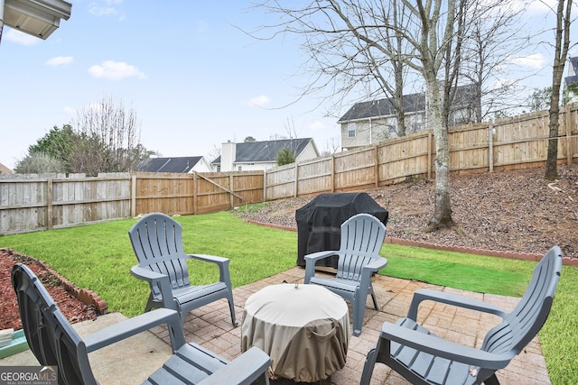 view of patio with a grill