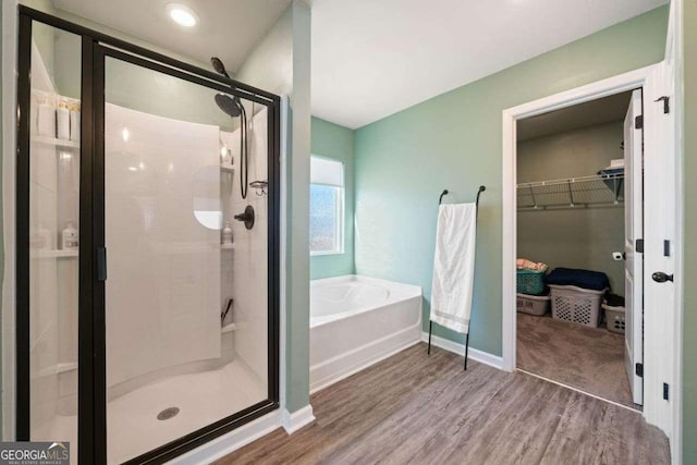 bathroom with hardwood / wood-style floors, toilet, and vanity