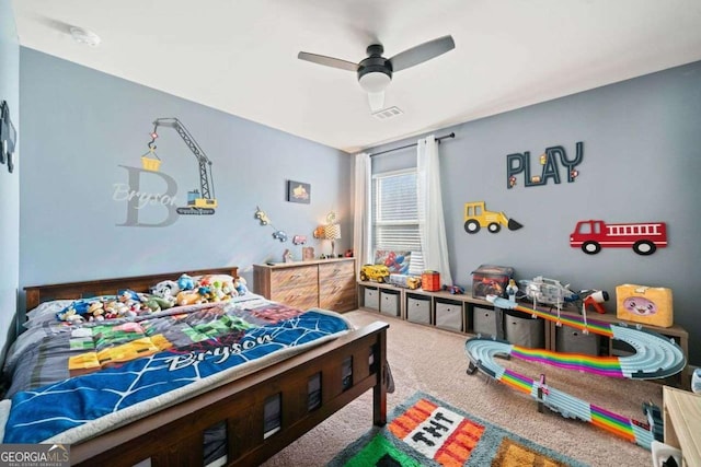 carpeted bedroom featuring ceiling fan