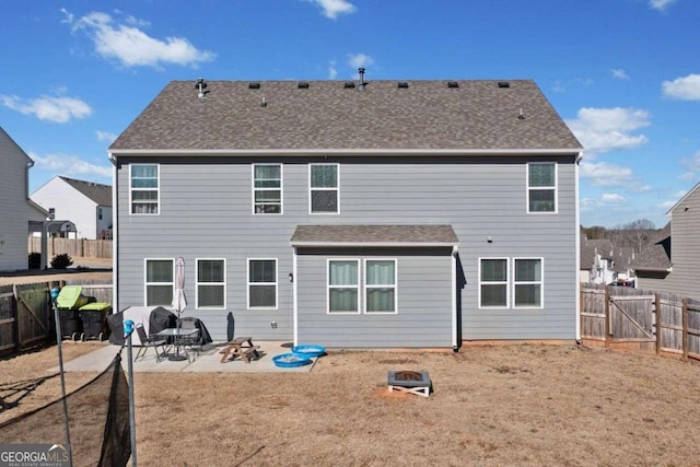 view of front of house featuring a garage, central AC unit, and covered porch