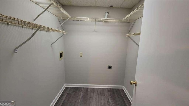 laundry room with hookup for an electric dryer, washer hookup, and dark hardwood / wood-style flooring