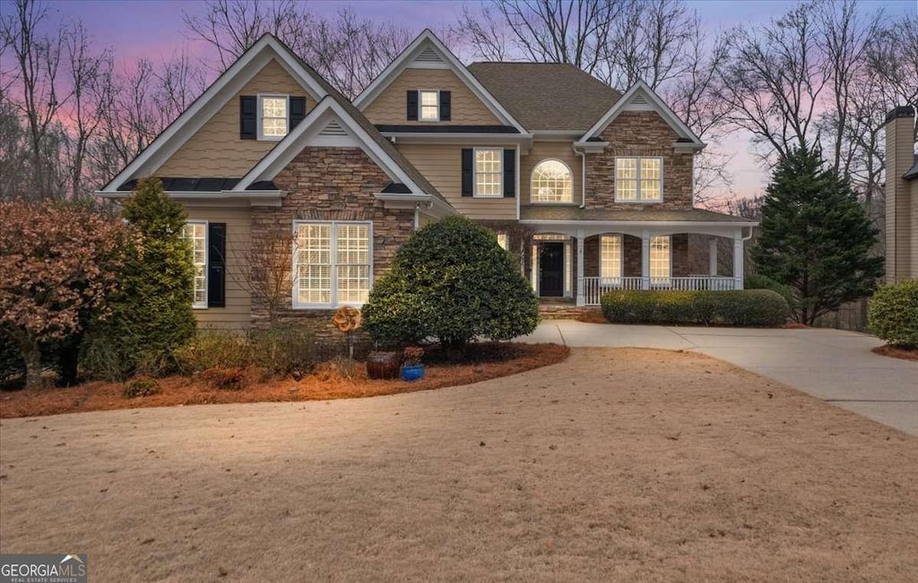 craftsman-style house featuring covered porch