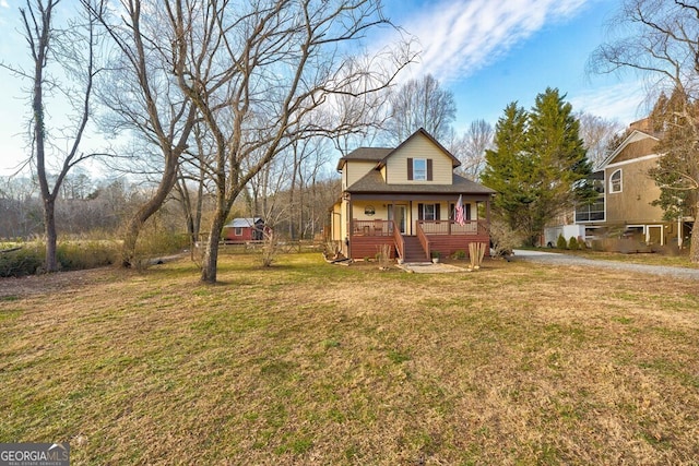 view of front of property with a front yard and a porch