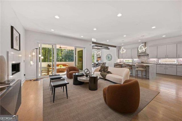 living room with light hardwood / wood-style floors