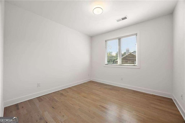 empty room featuring light hardwood / wood-style floors