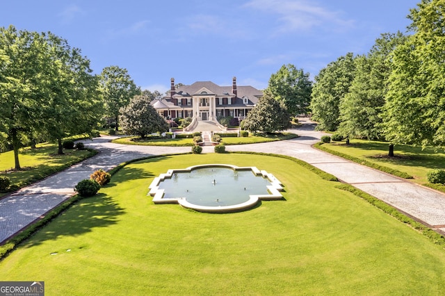 5200 Moore Rd, Suwanee, GA 30024 - view of home's community featuring a putting area