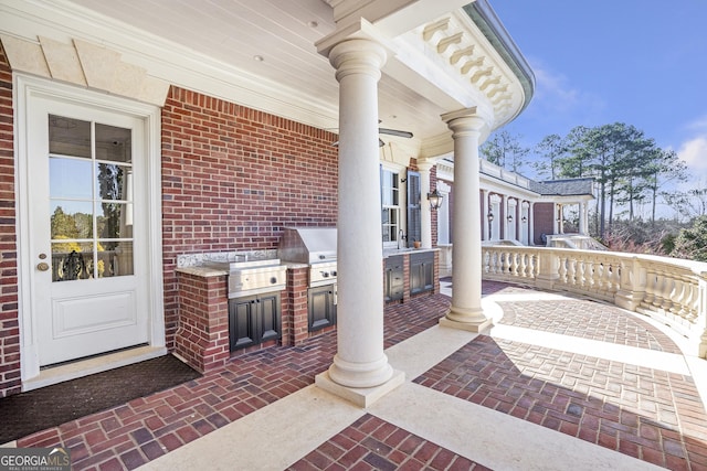 5200 Moore Rd, Suwanee, GA 30024 - view of patio with an outdoor kitchen and area for grilling