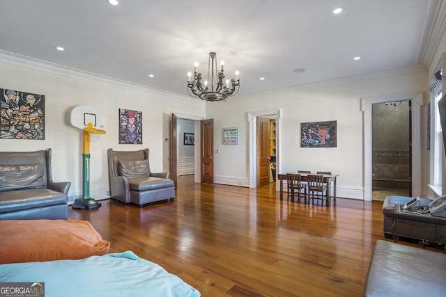 5200 Moore Rd, Suwanee, GA 30024 - living room featuring a chandelier, crown molding, hardwood / wood-style floors, recessed lighting, and baseboards