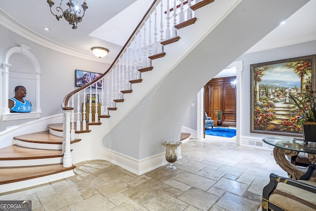 5200 Moore Rd, Suwanee, GA 30024 - stairway featuring stone tile flooring, ornamental molding, baseboards, a chandelier, and recessed lighting
