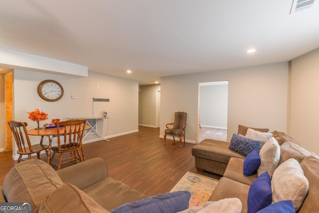 living room with dark hardwood / wood-style floors