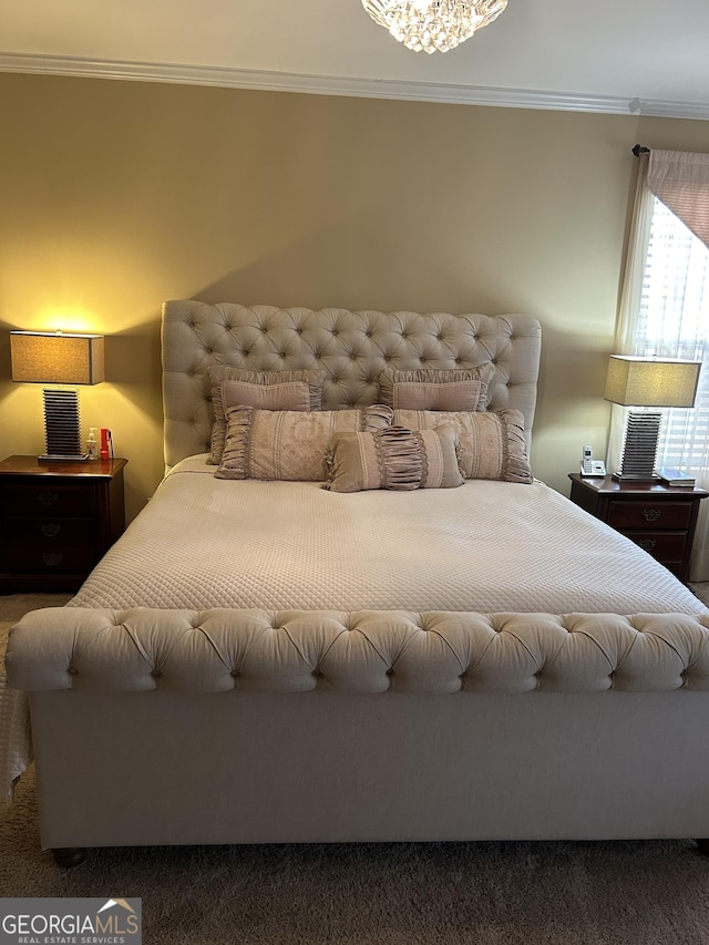 bedroom with crown molding