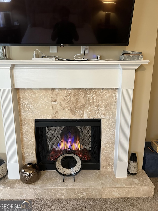 room details with a tiled fireplace