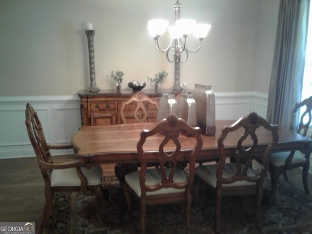 dining area featuring a chandelier