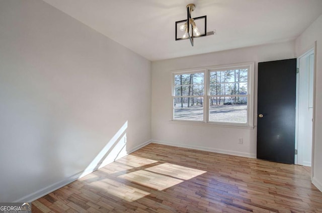 unfurnished dining area with light hardwood / wood-style floors