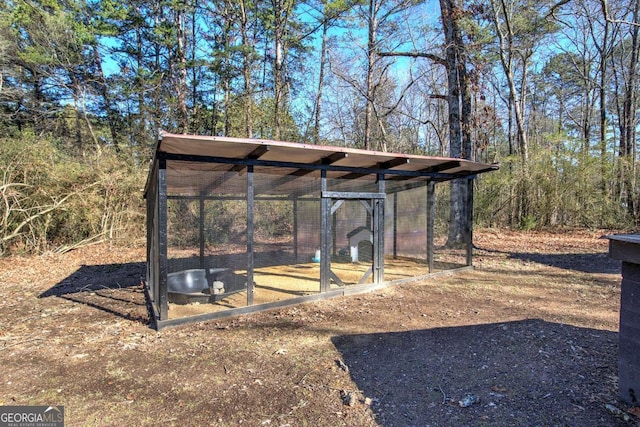 exterior space featuring an outbuilding