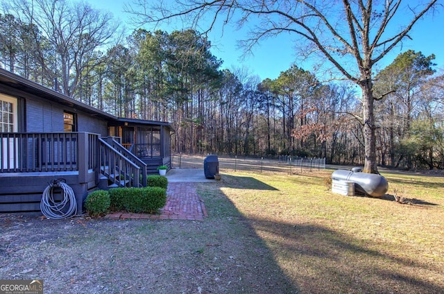 view of yard with a patio area and a sunroom