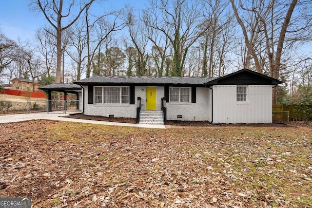 single story home with a carport