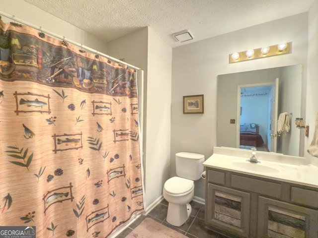 bathroom featuring a textured ceiling, tile patterned floors, vanity, toilet, and a shower with shower curtain