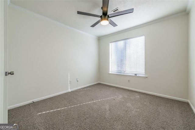 carpeted empty room with crown molding and ceiling fan