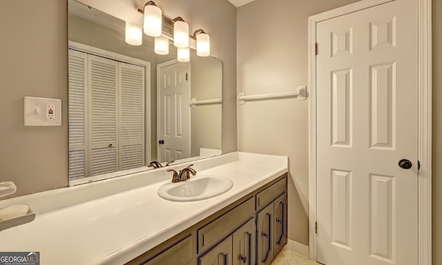 bathroom featuring vanity and tile patterned flooring