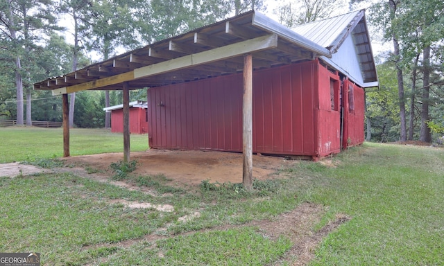 view of outdoor structure with a yard