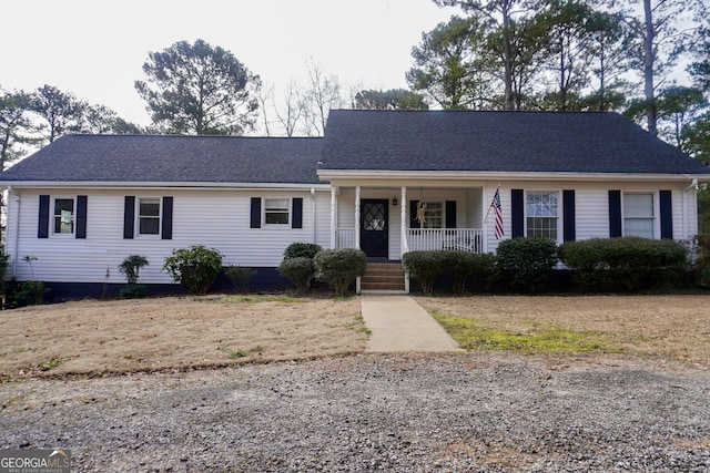 ranch-style house featuring covered porch